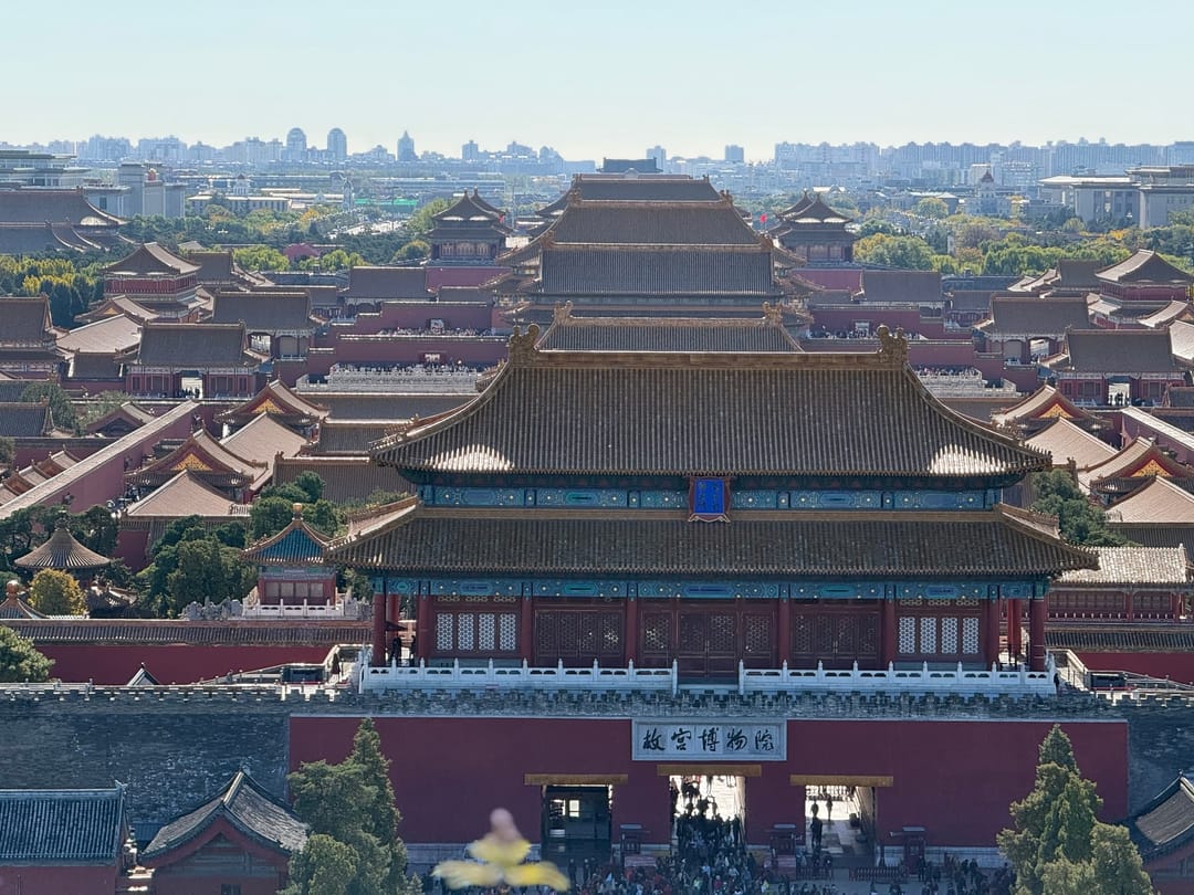 The roofs of the Forbidden City seen from the top of Jingshan Park, with the Shenwu Gate in front and the halls receding south